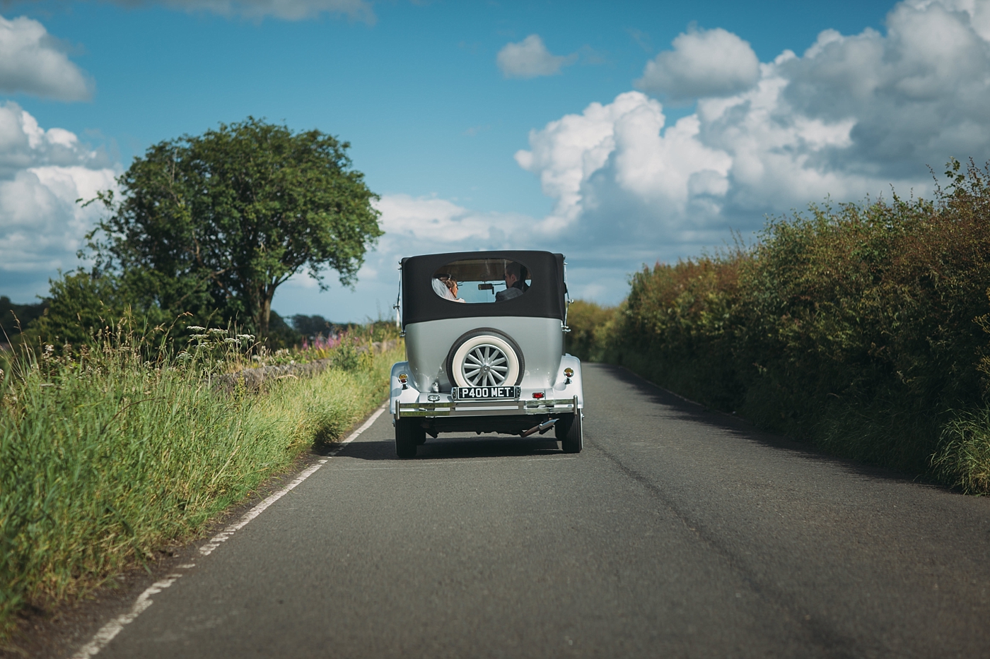 Met Wedding Car - Vintage car on country road