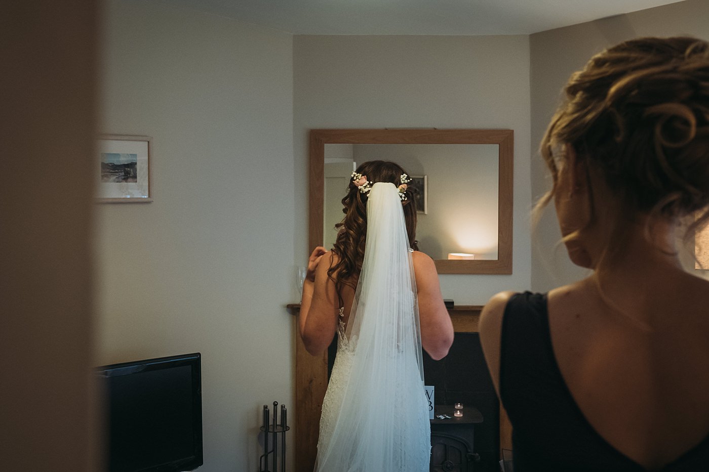 one last look in the mirror at this Christmas wedding at Glen Tanar