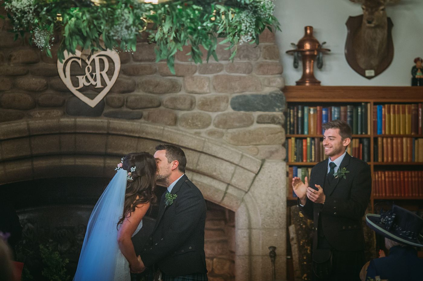 first kiss at a Christmas wedding at Glen Tanar