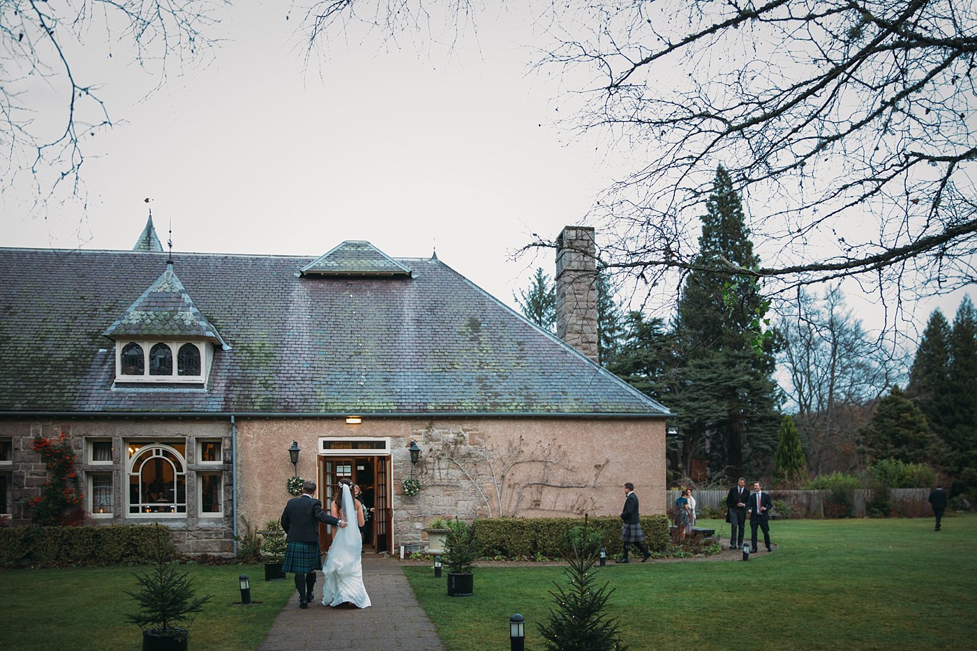 newlyweds join the party at their Christmas wedding at Glen Tanar