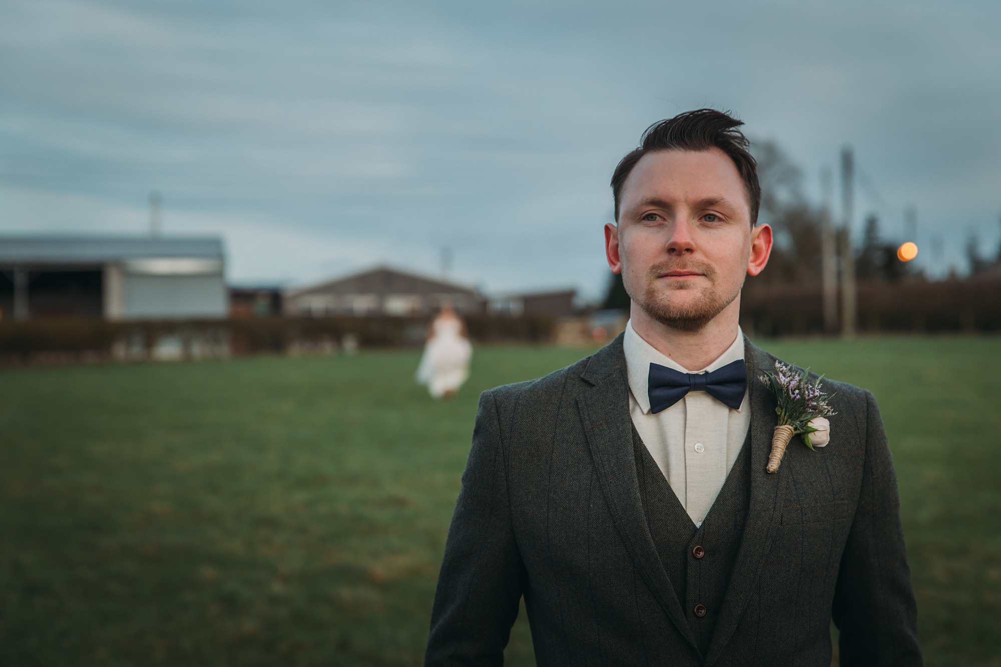 best wedding photographs of a groom waiting for his bride to arrive to their first look in Scotland