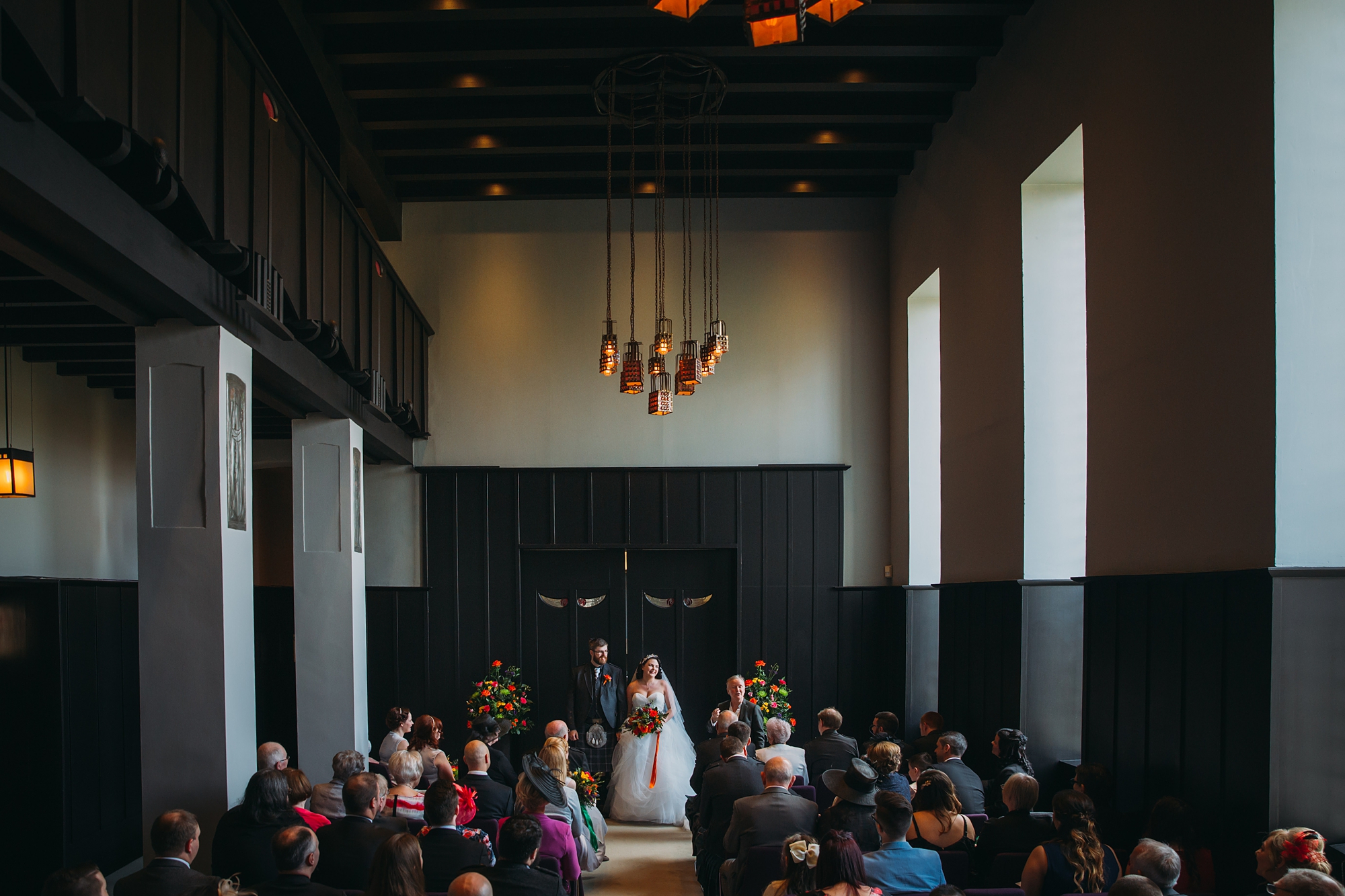best wedding photographs of a ceremony in house for an art lover