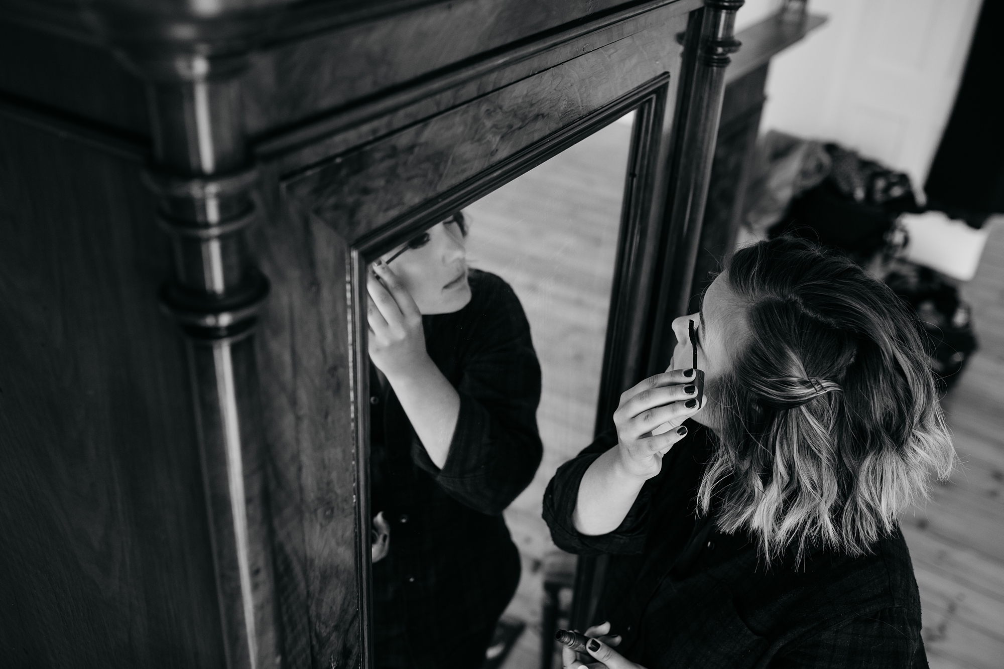 best wedding photographs of a bride doing her own makeup