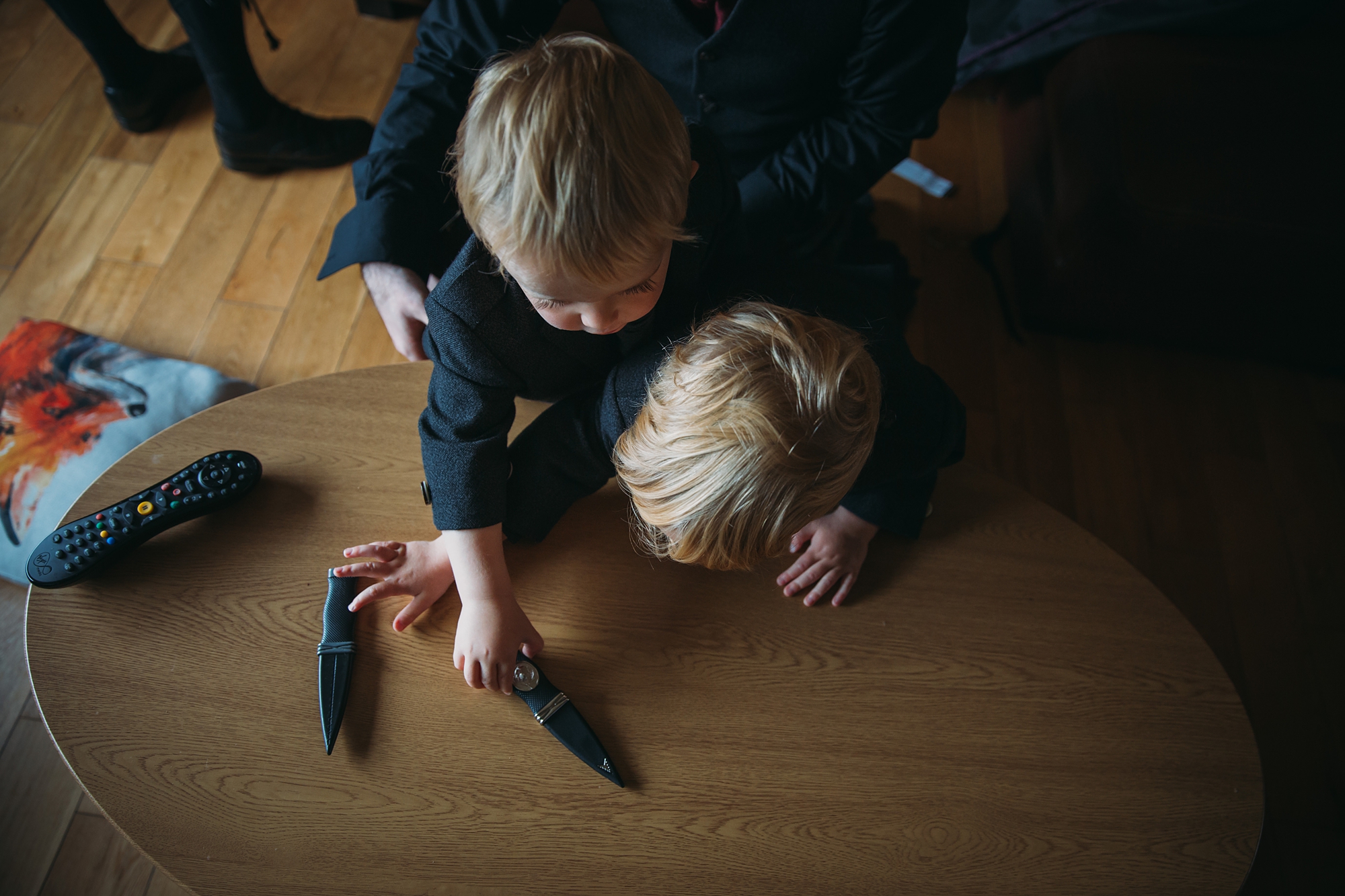 best wedding photographs of two small boys getting ready for their parents wedding