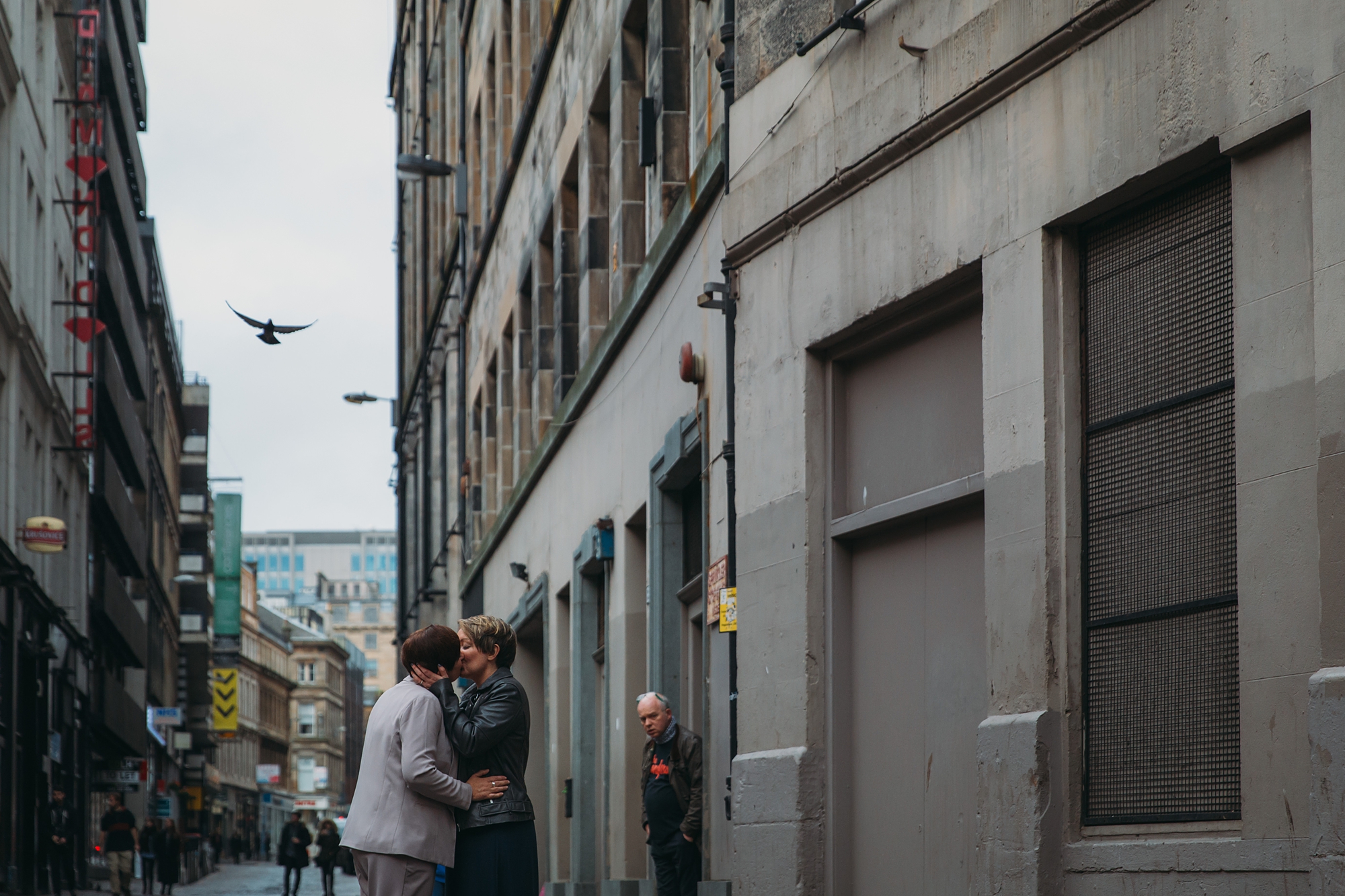 best wedding photographs Tracy & Linda kiss in Glasgow