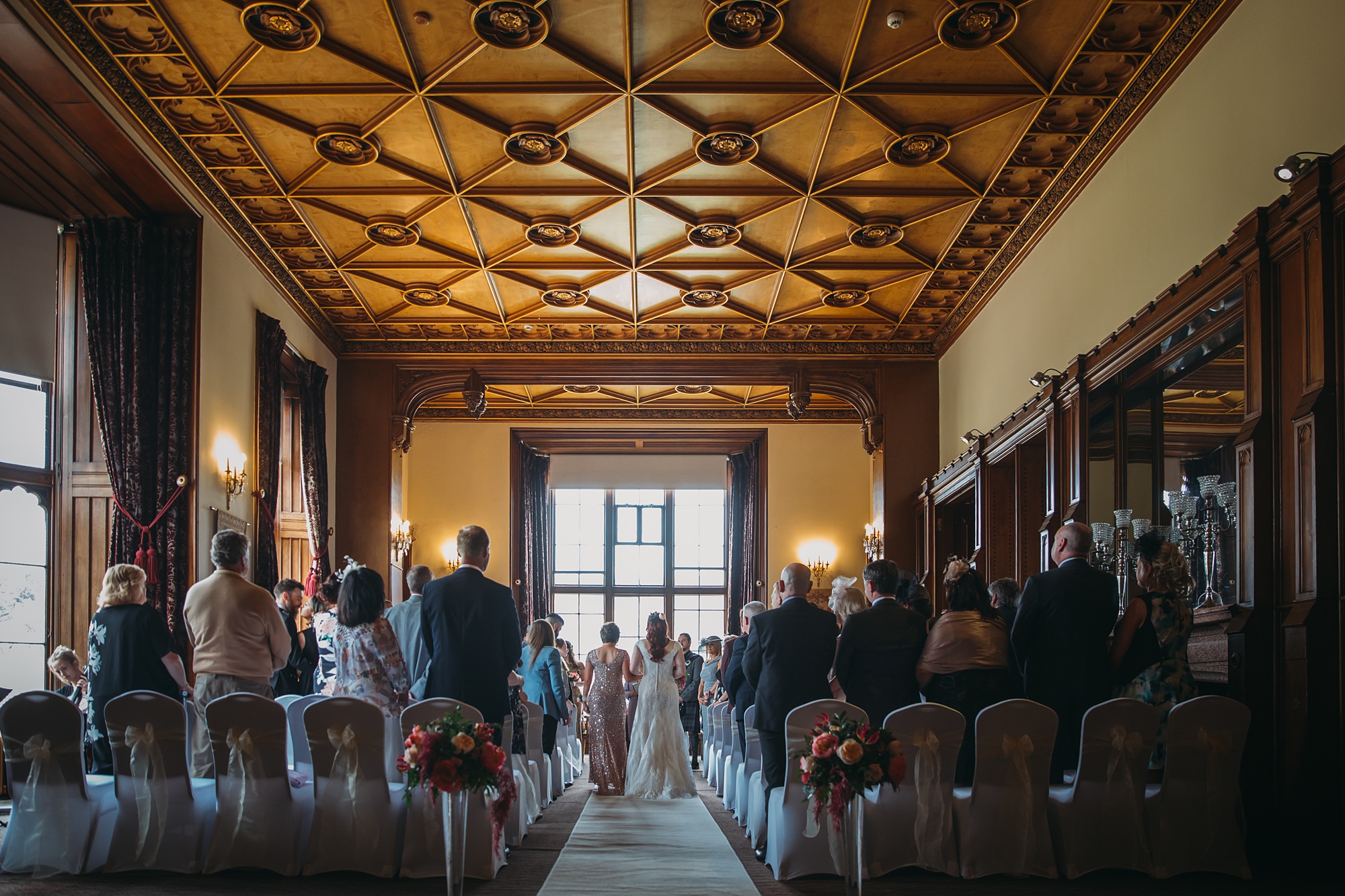 Bride walks down aisle with her mother for our best wedding photographs