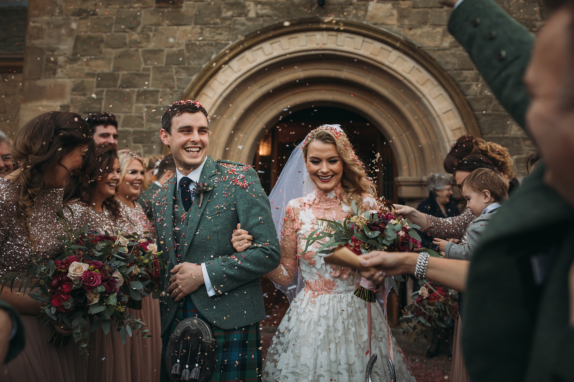 best wedding photographs - confetti run after getting married