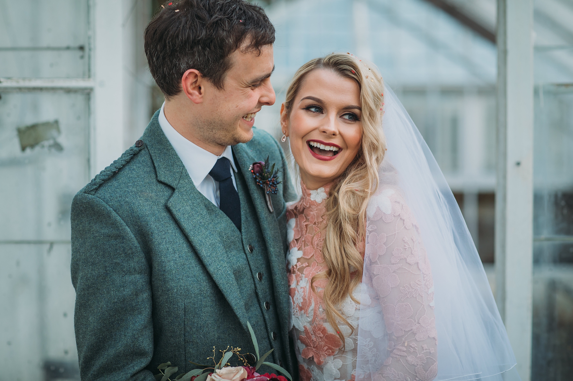 best wedding photographs at carlowrie castle, bride and groom laugh