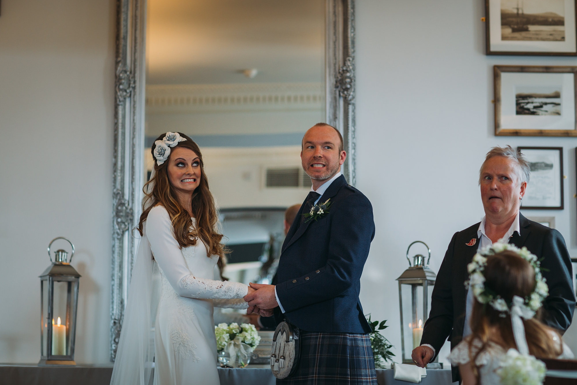 best wedding photographs in Arran at the Douglas Hotel - funny faces from the coupke during their ceremony