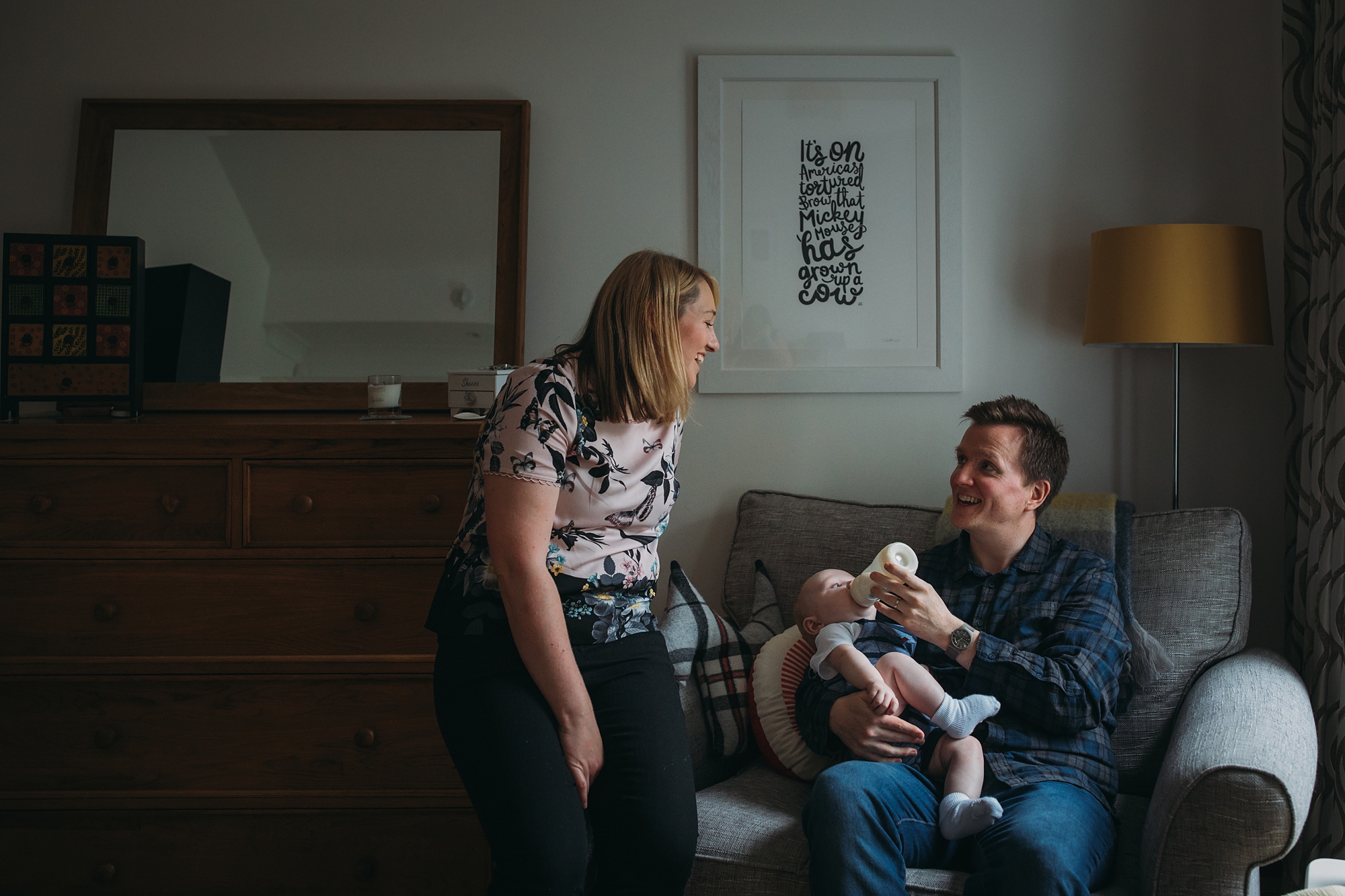 A family of three in the window light - best wedding photographs