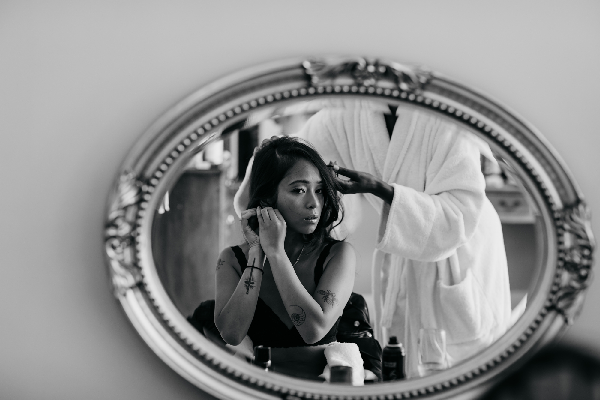 A beautiful bride reflected in a mirror as part of our best wedding photographs