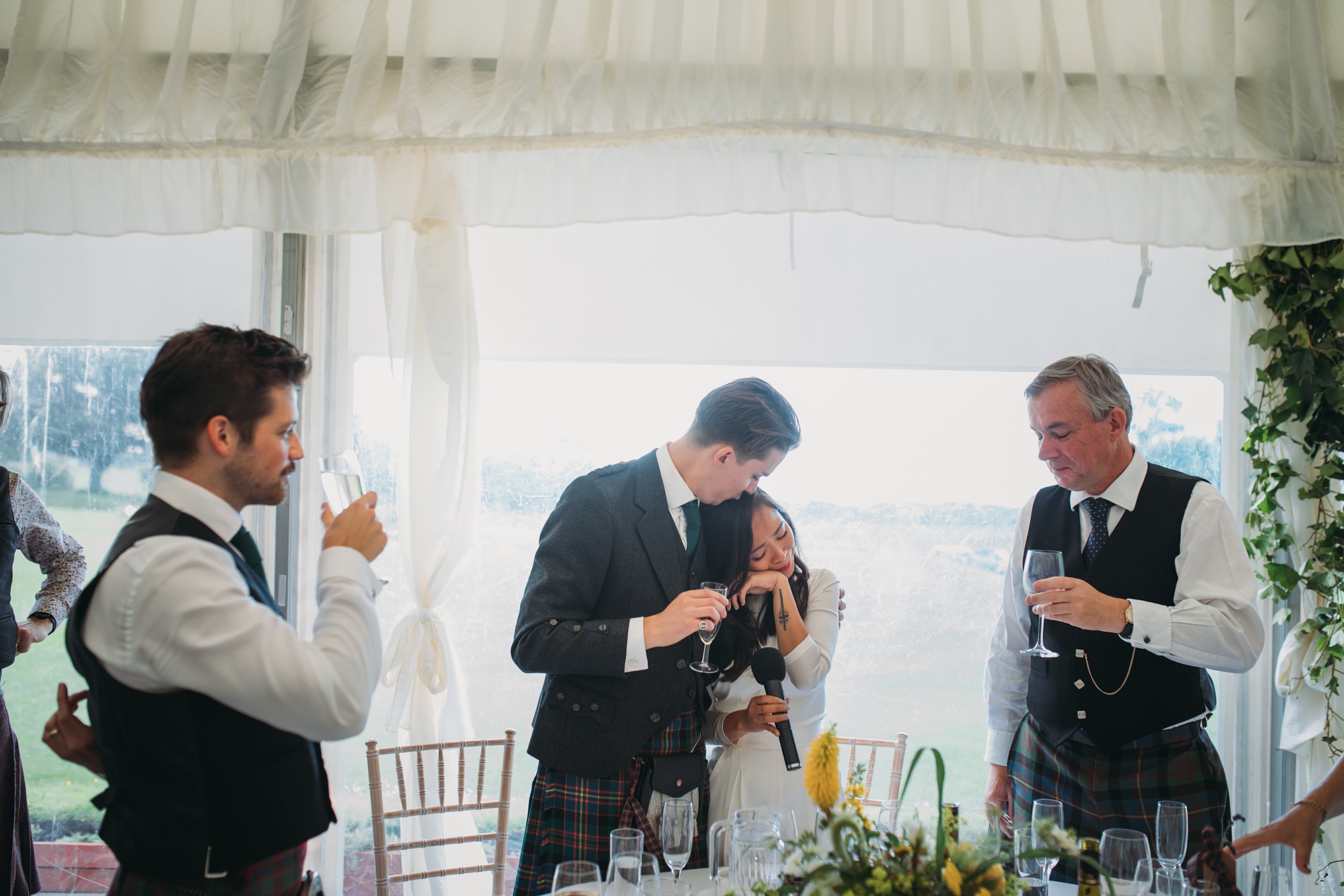 A bride cries after a heartfelt speech at Dunglass Estate, best wedding photographs