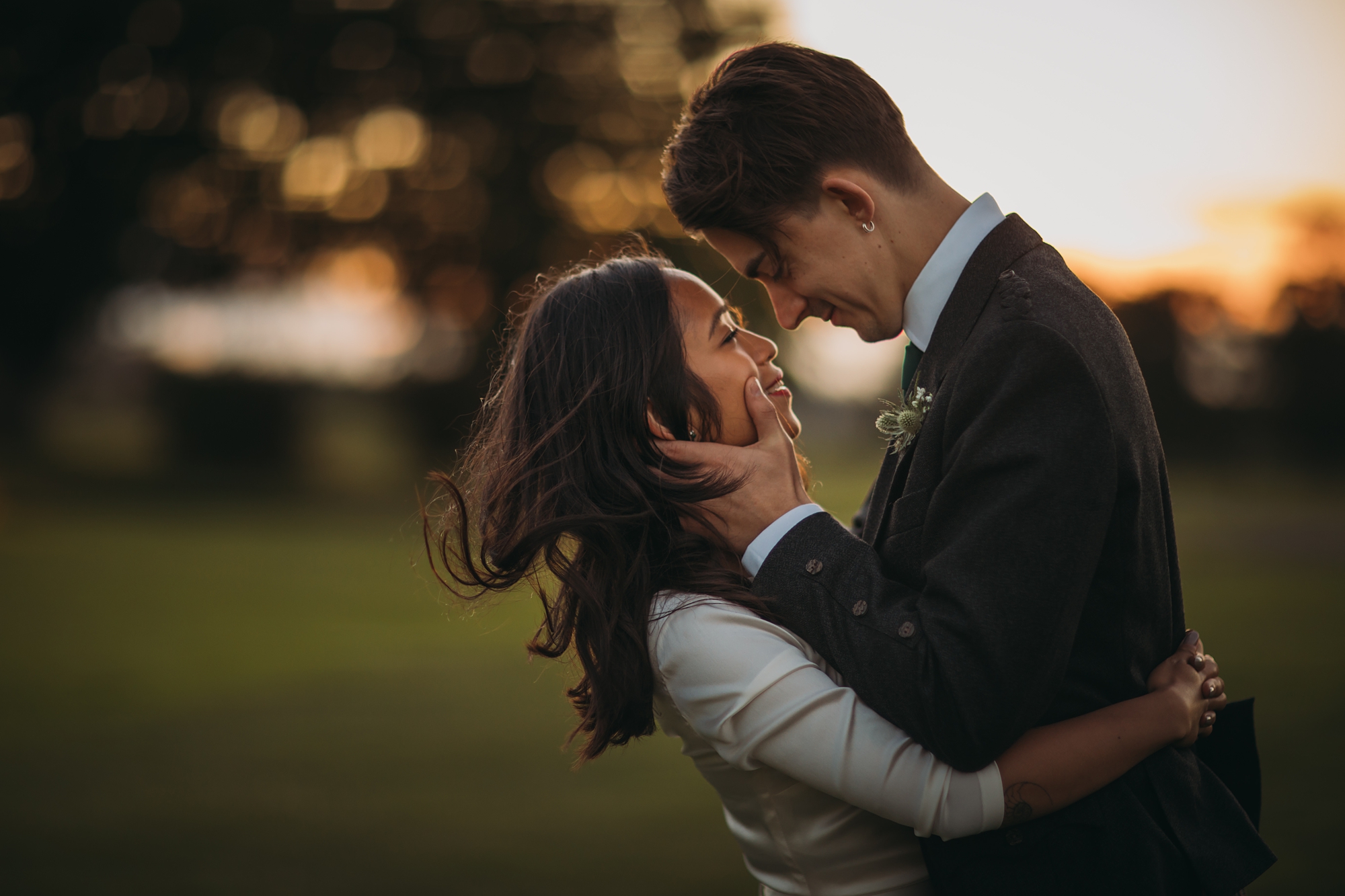 Couple embrace at Dunglass Estate during sunset - best wedding photographs