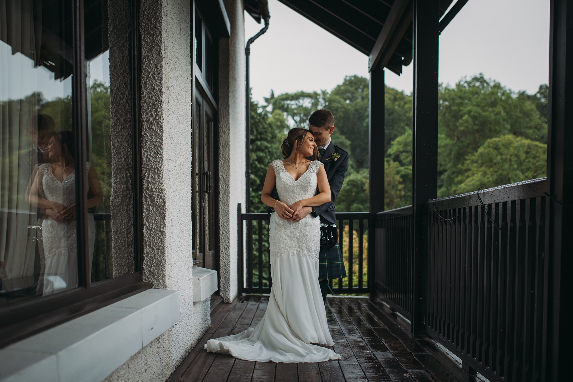 Couple embrace at Brig O'Doon, part of our best wedding photographs blog