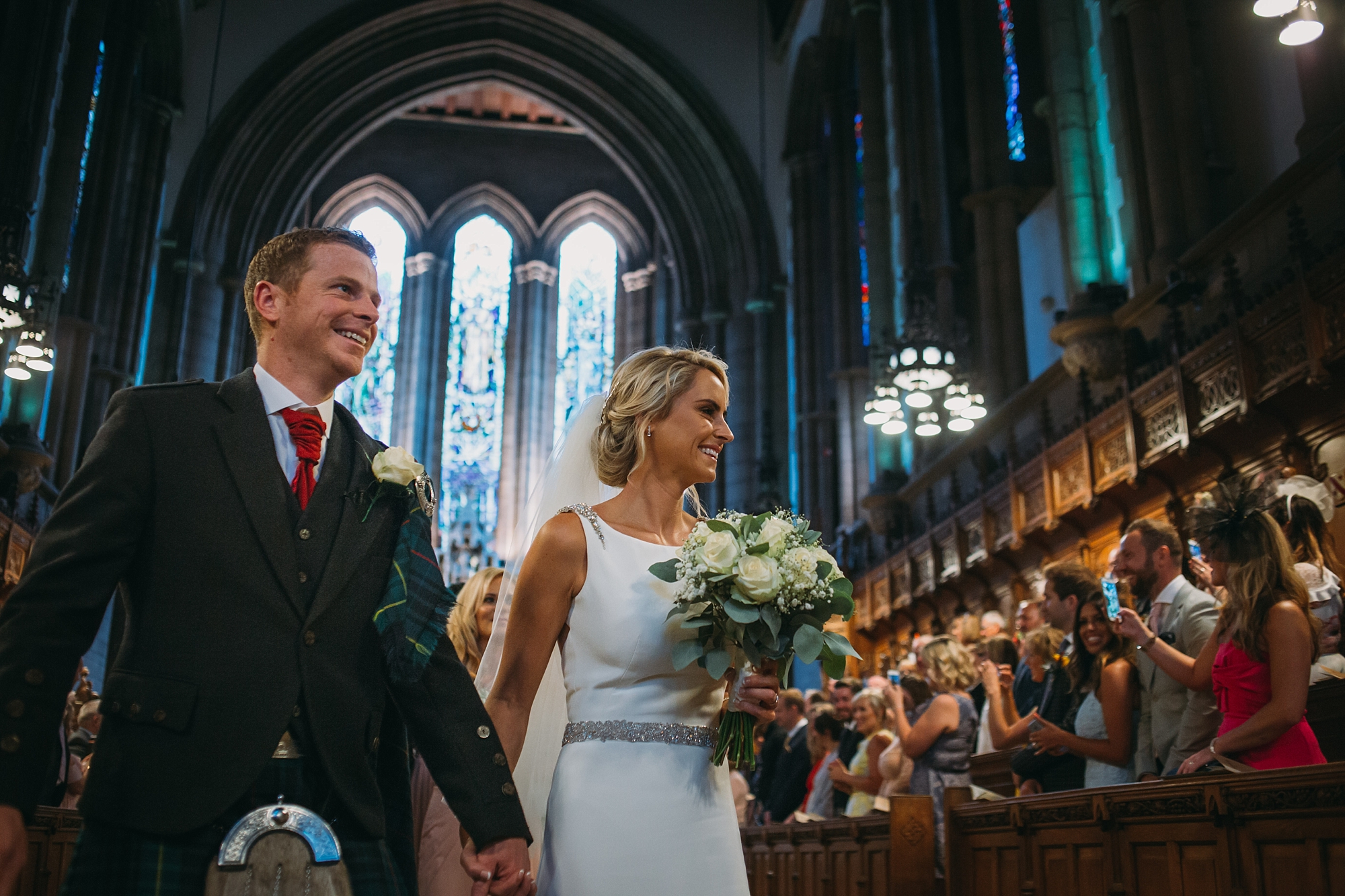 Newlyweds leave Glasgow University Chapel - best wedding photographs