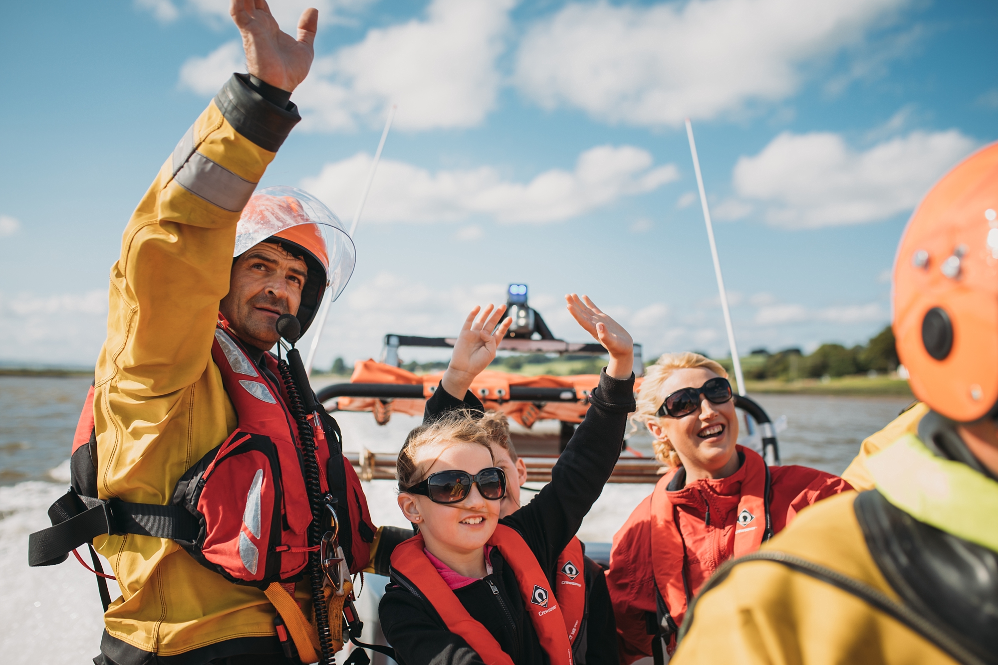 best wedding photographs of exciting ways to arrive at your ceremony - by lifeboat