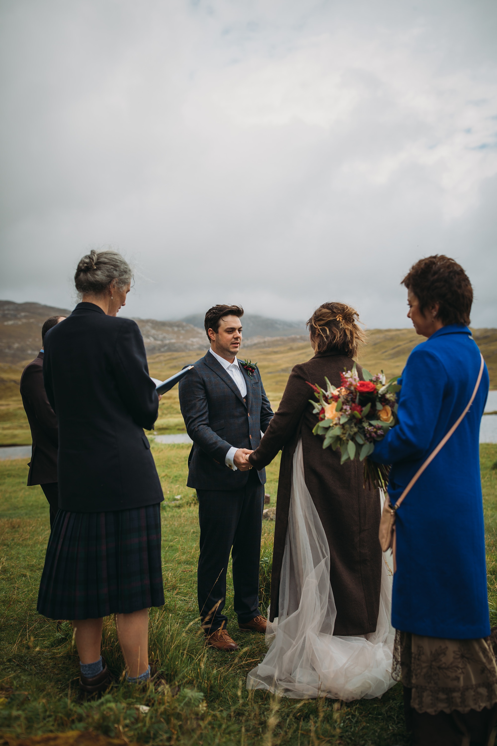 Eloping to Scotland at Lochinver and Ardvreck Castle. Civil ceremony on banks of a loch.