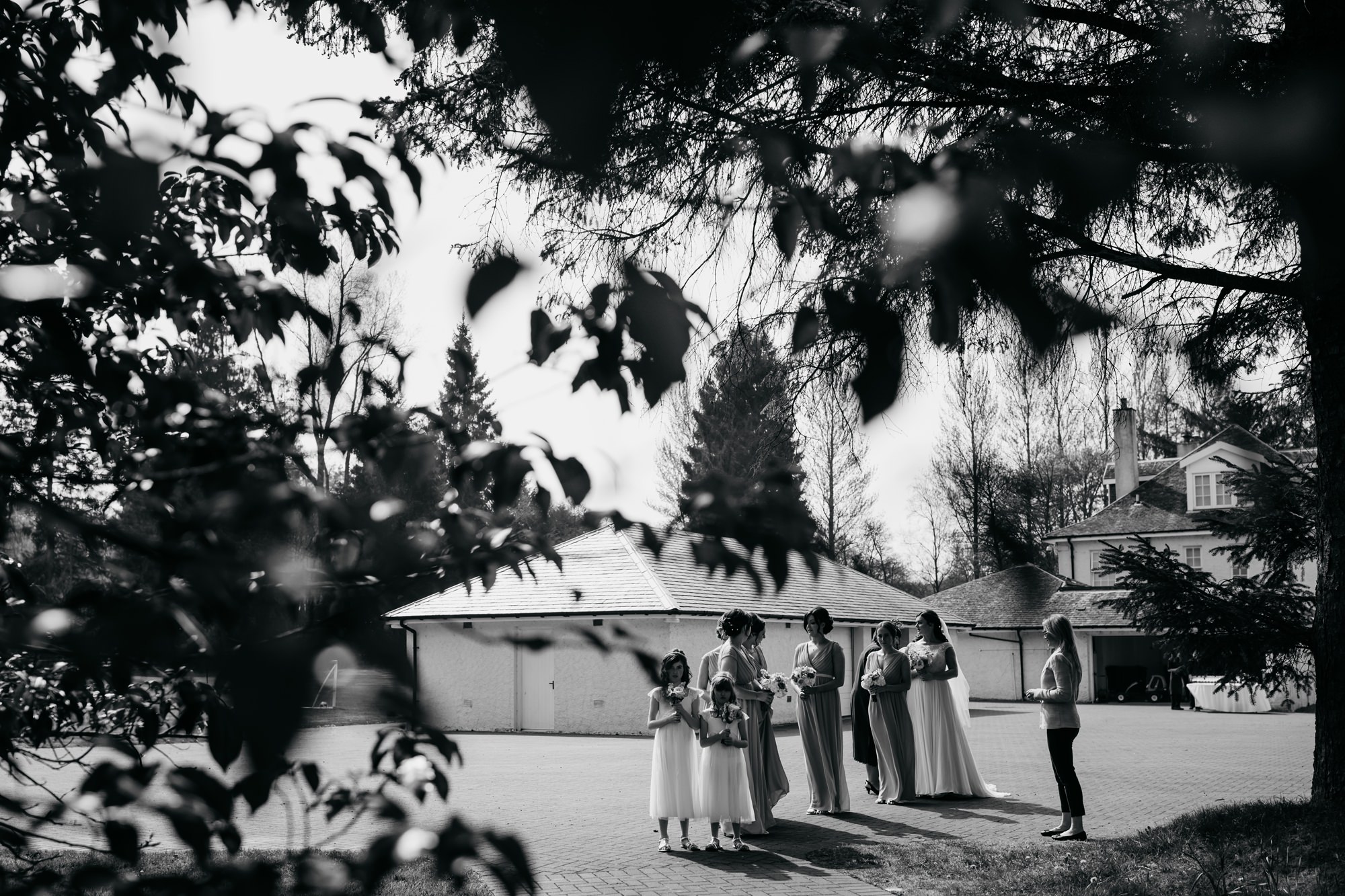 Bride waits with her bridal party ahead of her High Wards wedding ceremony