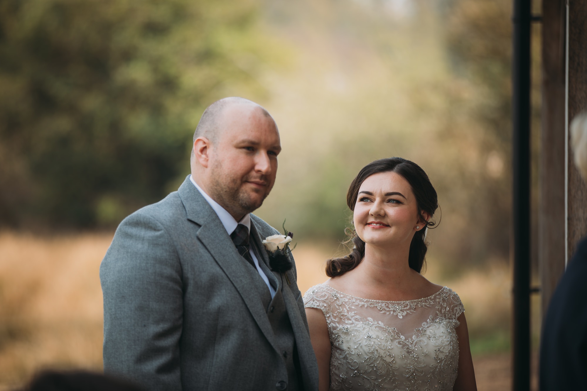 Bride looks at Groom loving during their High Wards wedding ceremony