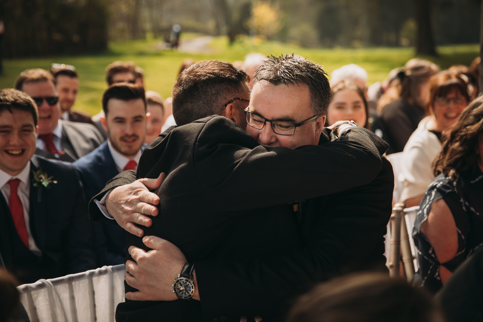 Mexican hugs between strangers at a High Wards wedding