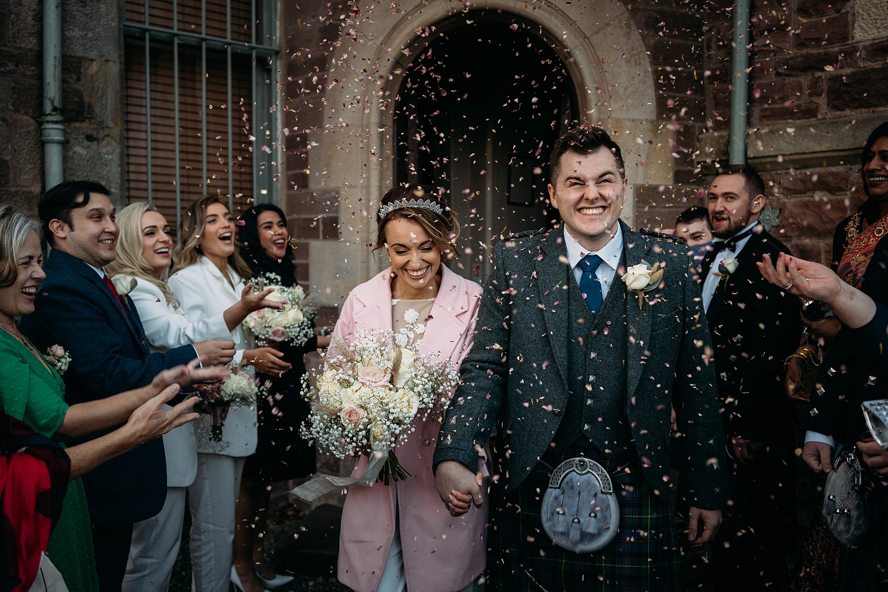 cromlix hotel chapel exterior bride groom confetti shot