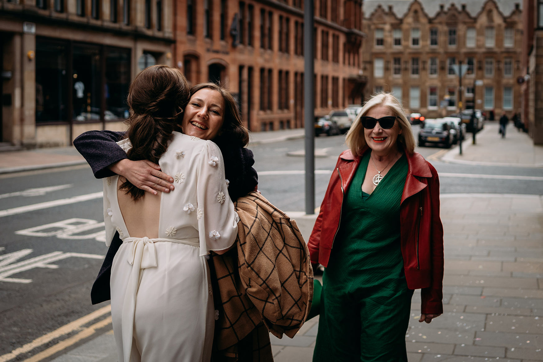 guests hug at Glasgow City Chambers Wedding