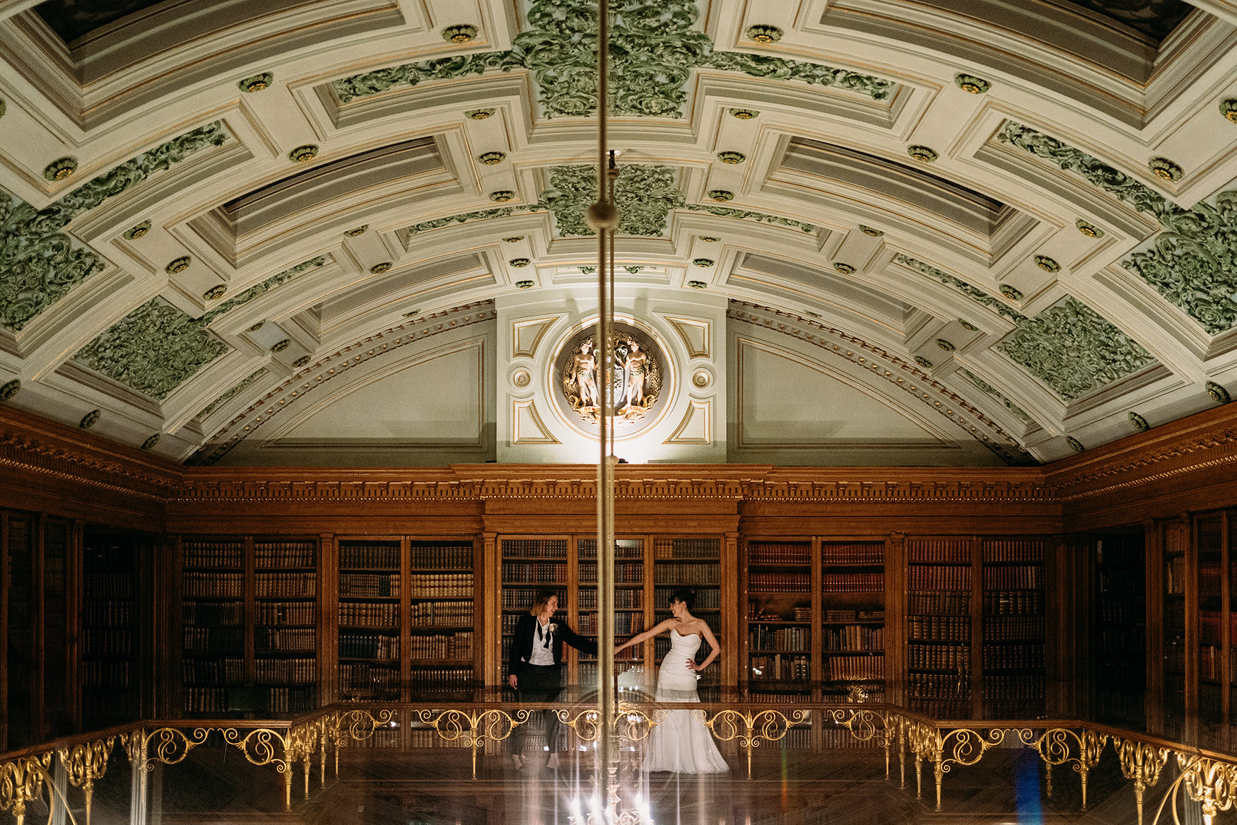 Two brides in the library at their Royal College of Physicians Wedding Edinburgh