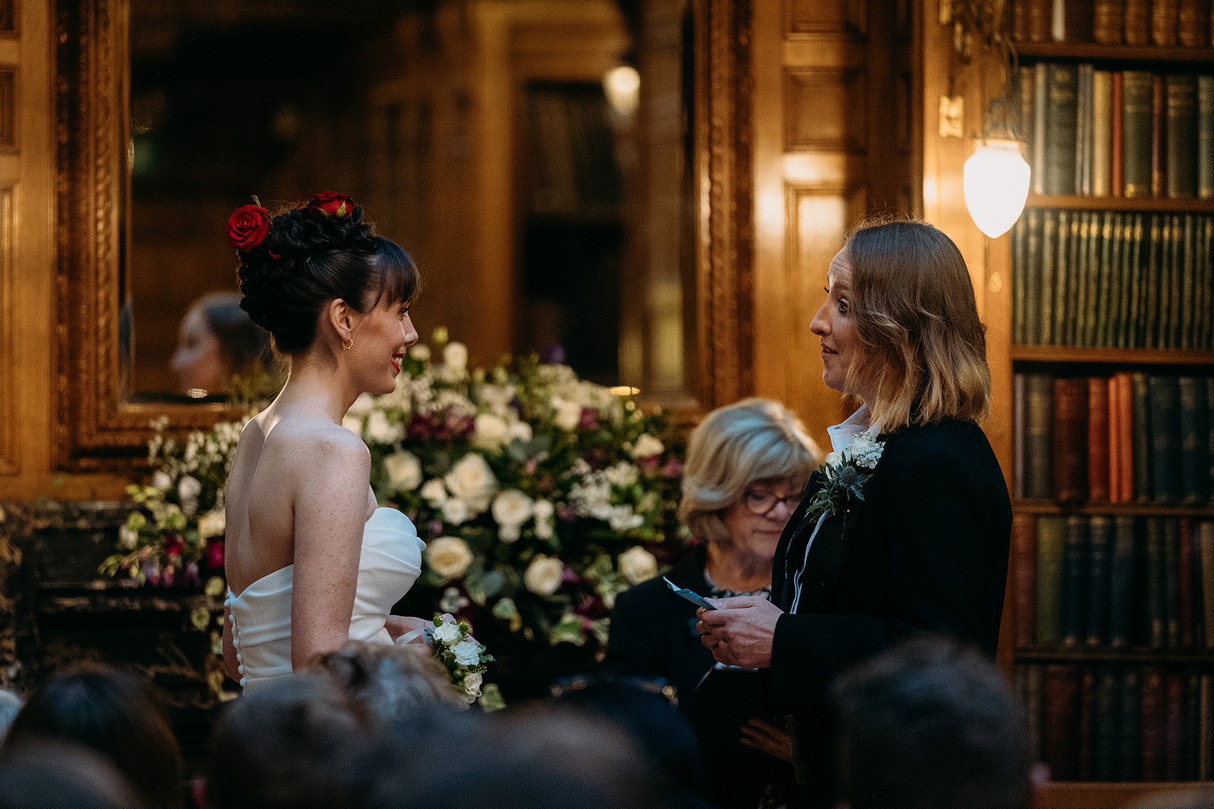 lesbian couple exchange vows during Royal College of Physicians Wedding ceremony