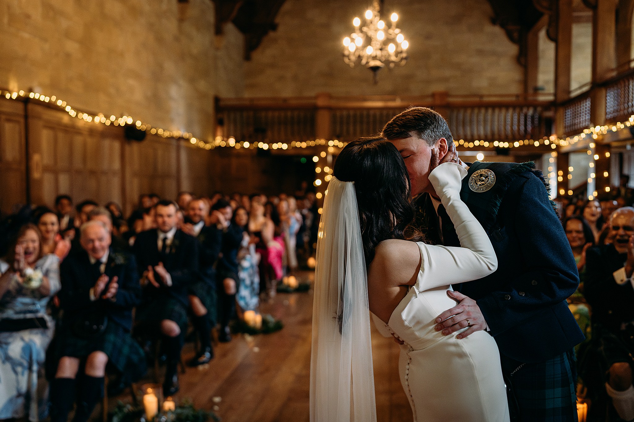 First kiss at Indo-Scottish Achnagairn Castle wedding