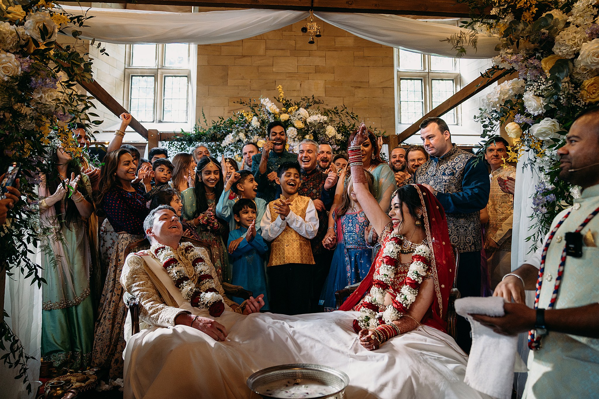 Bride finds ring first during games at Indo-Scottish Achnagairn Castle wedding