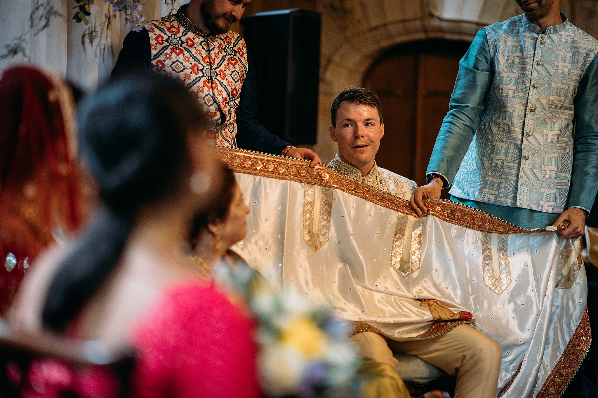 Groom sees bride in red lehenga for first time at their Indo-Scottish Achnagairn Castle wedding