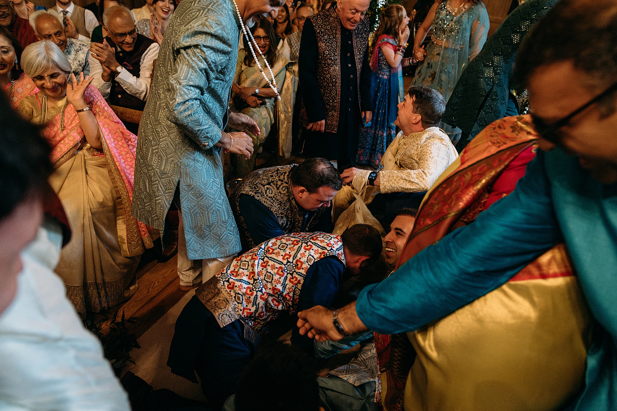 Groom ambushed at beginning of ceremony, his shoes are stolen at his Indo-Scottish Achnagairn Castle wedding ceremony