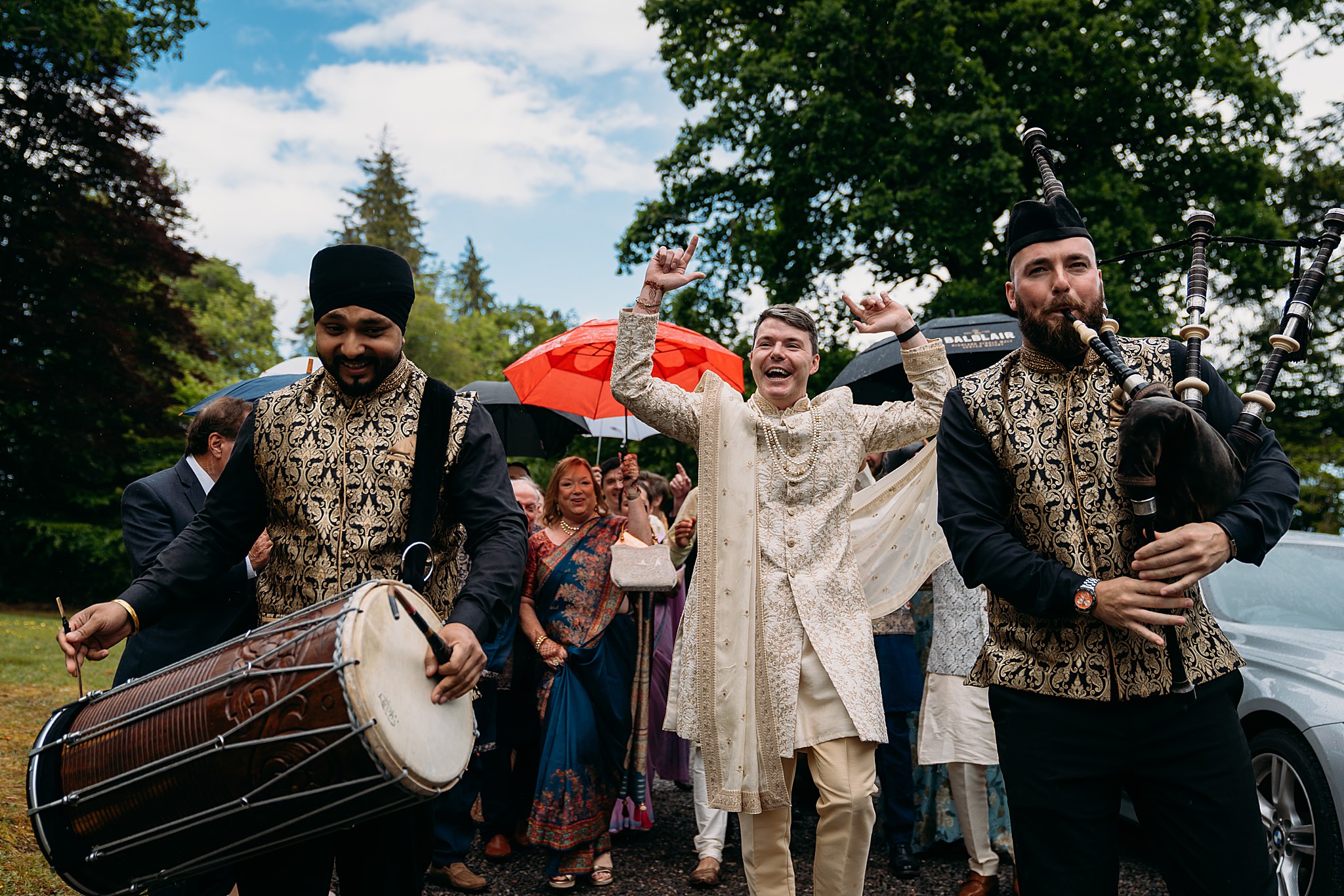 Dhol & Pipes perform at a Indo-Scottish Achnagairn Castle wedding.