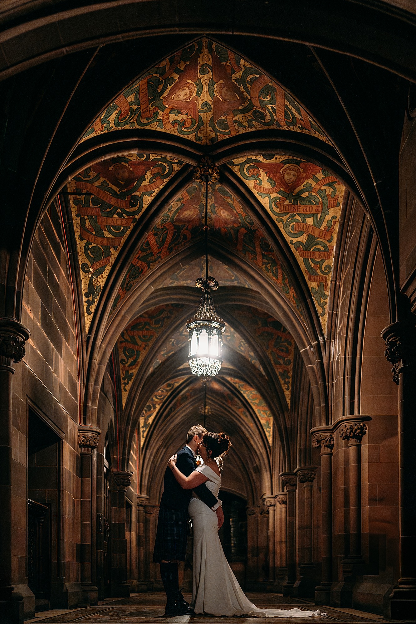 Bride and groom in grand foyer of Coats Paisley Twilight Wedding