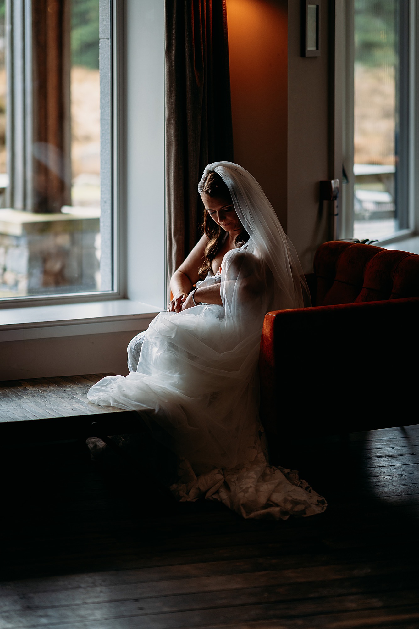 Bride breastfeeds her son at Kingshouse Glencoe wedding