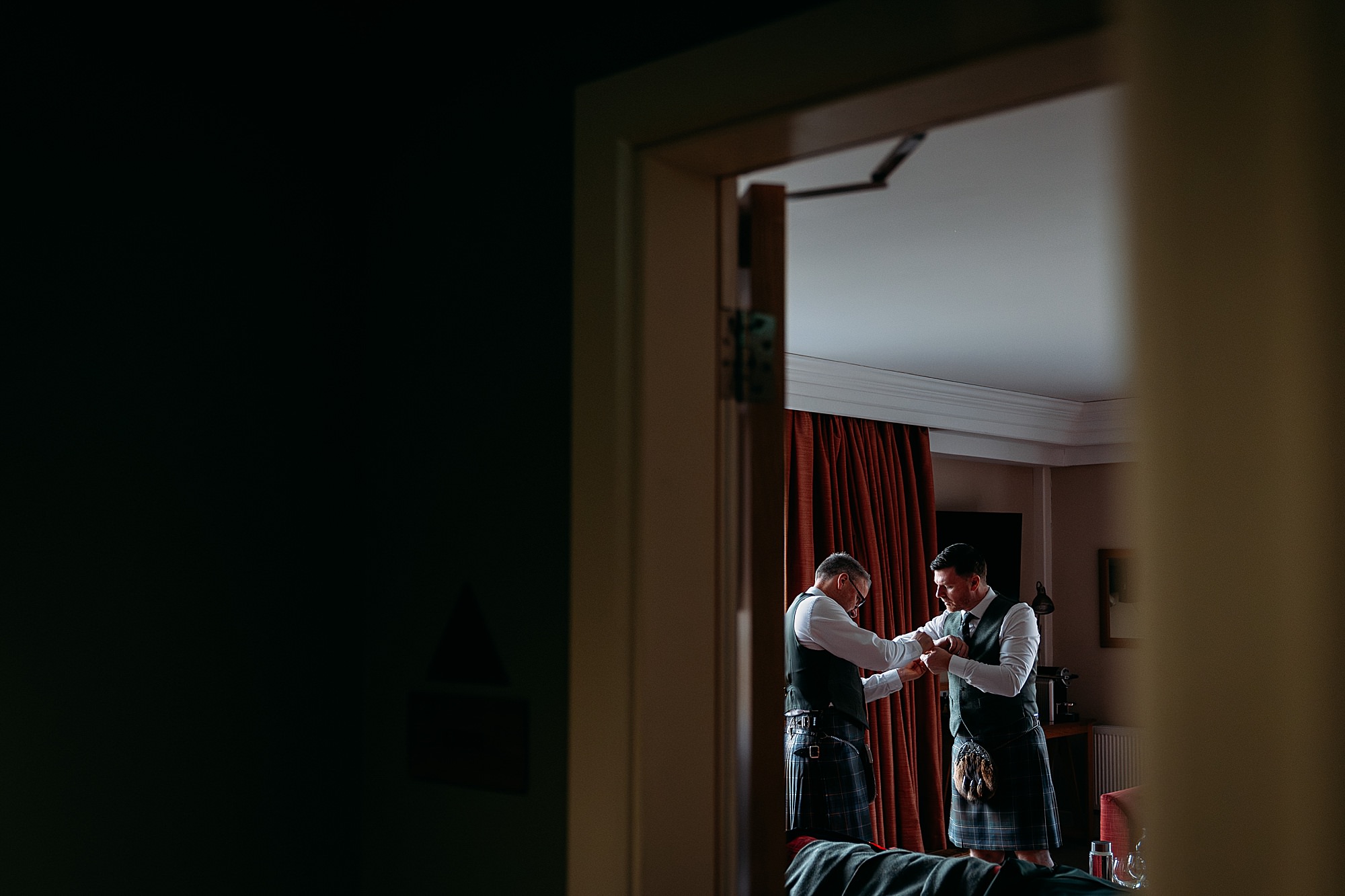 Groom getting ready for her Glencoe mountain wedding. 